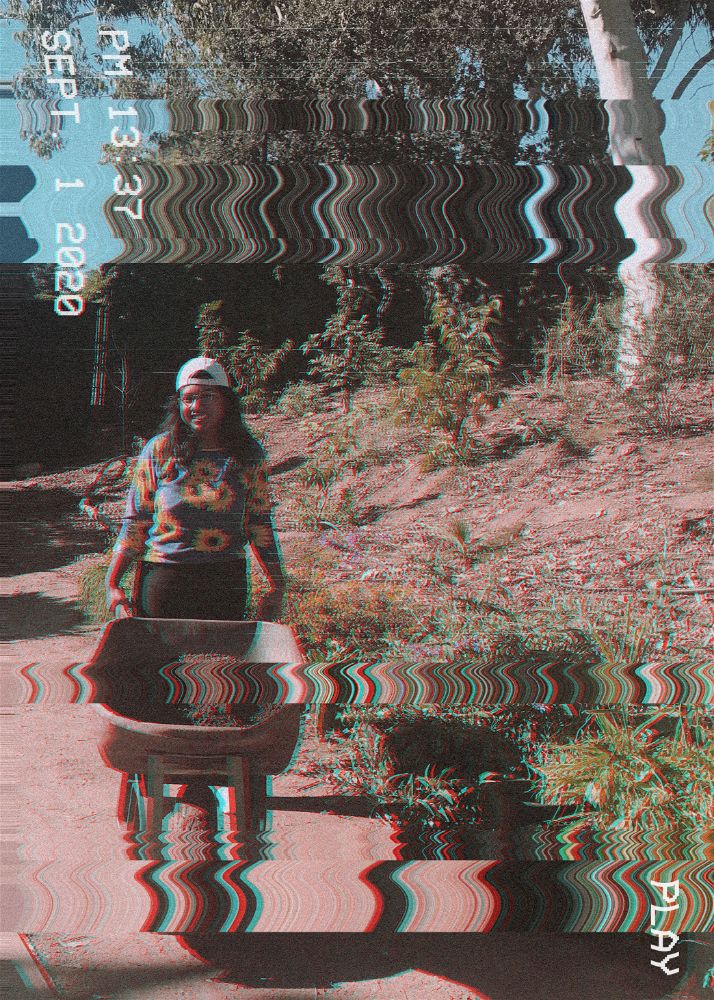 distorted photo of jessica rahman with a wheelbarrow